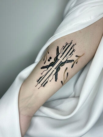 Minimal Ornamental Tattoo