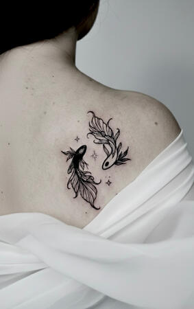 Symbolic Fine Line Tattoo