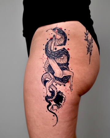 Ornamental blackwork tattoo – leg