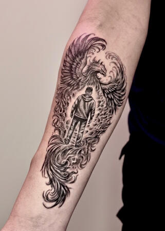 Realistic Phoenix Forearm Tattoo